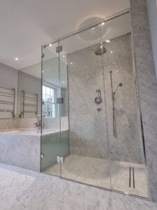 Luxury frameless glass shower enclosure made to measure in London bathroom chrome fittings