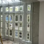 Bespoke decorative mirror wall installation in South West London