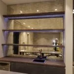 Decorative antique mirror wall panels installed in a kitchen