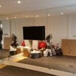 Large custom mirror wall panels fitted in a luxury interior