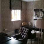 Decorative Full height mirror installation covering an entire office room wall