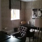 Decorative Full height mirror installation covering an entire office room wall