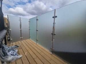 Satin frameless glass balcony balustrade installation in Fulham, South West London