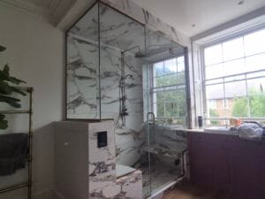 Luxury frameless steam glass shower enclosure made to measure in London bathroom